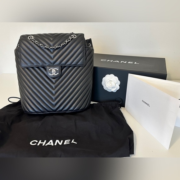 CHANEL Handbags - Chanel Black Chevron Quilted Lambskin Leather Large Urban Spirit Backpack